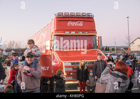 Llansamlet, Swansea, UK. 16th Nov, 2017. Coca-Cola truck at Tesco Extra Llansamlet, Nantyffin Road, Llansamlet, Swansea, West Glamorgan, Wales, UK, U.K., Coca Cola truck on a Christmas tour around UK. Controversy of handing out free drinks because of obesity and dental concerns. Credit: Paul Quayle/Alamy Live News Stock Photo