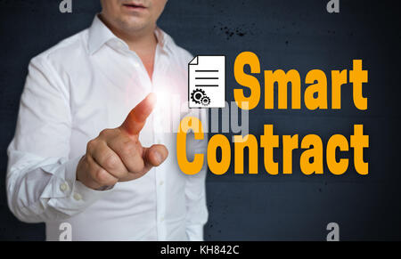Smart contract touchscreen is operated by man. Stock Photo