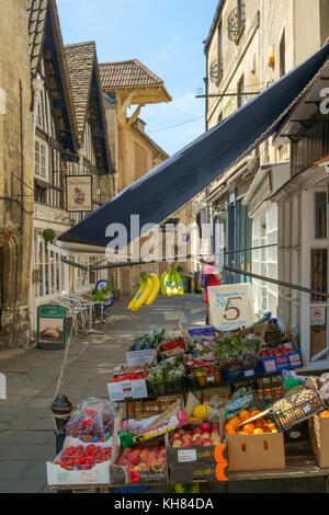 Small local shops on the quaint narrow streets on a sunny spring day in Bradford on Avon, Wiltshire, UK Stock Photo