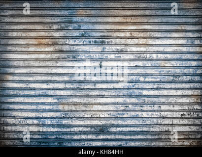 The old roller shutter garage door. Vintage garage. Stock Photo