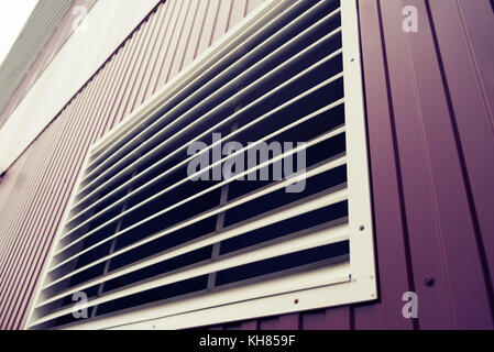 Large ventilated white grill installed on the street Stock Photo