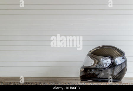 Black fiber helmet against a white background.Copy space for text. Stock Photo