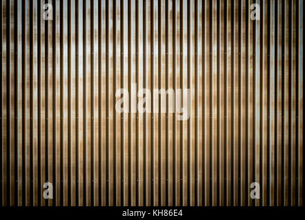 Old rusty corrugated metal wall of a barn building Stock Photo