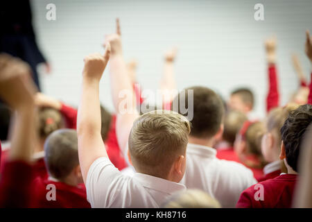 unidentifiable children in a primary school assembly Stock Photo