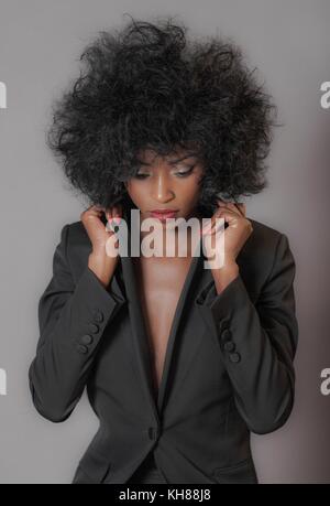 Close up of a young attractive African women with hat Stock Photo - Alamy