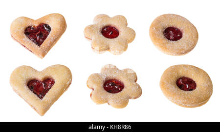Collection of traditional Christmas cookies. Beautiful cut shapes combined with jam. Isolated on white background. Stock Photo