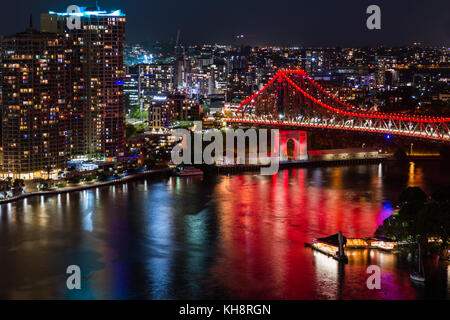 Aerial view of Brisbane city skyline, river and lit up story bridge at night. Queensland, Australia. Stock Photo