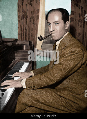 George Gershwin - playing piano with pipe in his mouth.   American composer & pianist, 26th September 1898 - 11th July 1937 Stock Photo