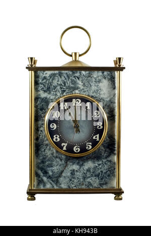 vintage massive desk clock in a block of gray stone (magnesite) with brass details isolated Stock Photo