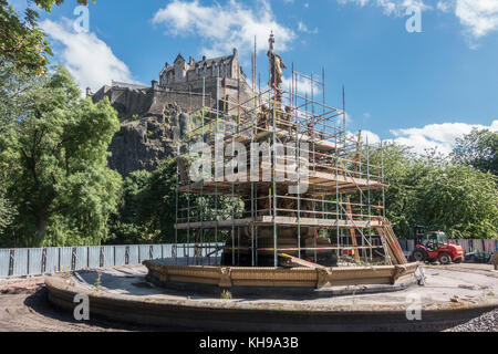 The Ross Fountain Under Construction In Princes Street Gardens Edinburgh With Edinburgh Castle In The Background, Scottish Capital June 2017 Stock Photo