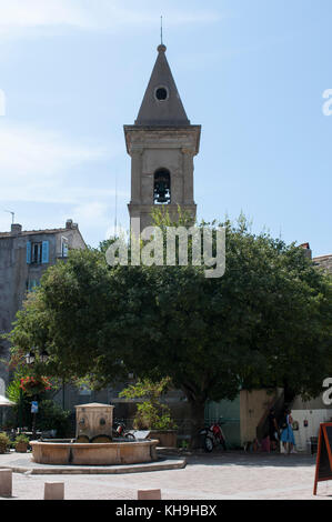 Haute Corse, Corsica: the fountain of Doria Square in the center of Saint-Florent, popular summer vacation spot known as the corse Saint-Tropez Stock Photo