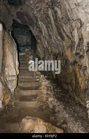 Stairs coming down to the cave Stock Photo