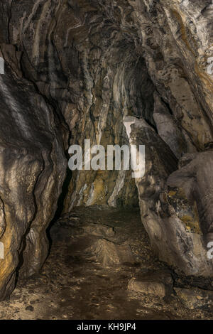 Mysterious hallway into the cave Stock Photo