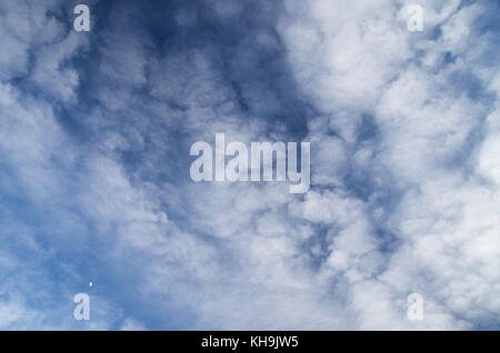 Deep Blue sky with white clouds Stock Photo