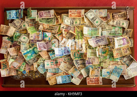 a frame with money from different countries, banknotes from different countries overlapping each other,background money collection Stock Photo