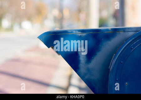 curbside mail box for easy drop off of mail. Blue postal service box. Stock Photo