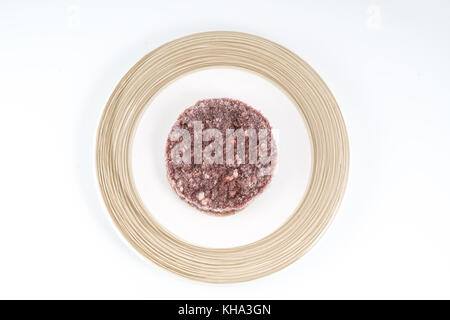 frozen hamburger on a plate Stock Photo