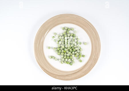 frozen peas on a plate Stock Photo