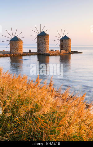 Sunrise image of the iconic windmills in Chios town. Stock Photo