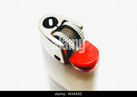 Close up on a used white lighter with red button. No fire. Stock Photo