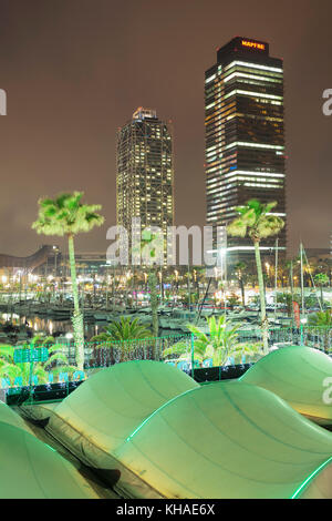 Mapfre Tower and Arts Tower beoi night, Port Olimpic, Barcelona, Catalonia, Spain Stock Photo