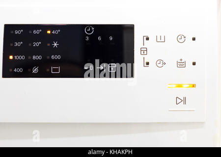 Display washing machine. Macro photo part of modern home washing machine Stock Photo