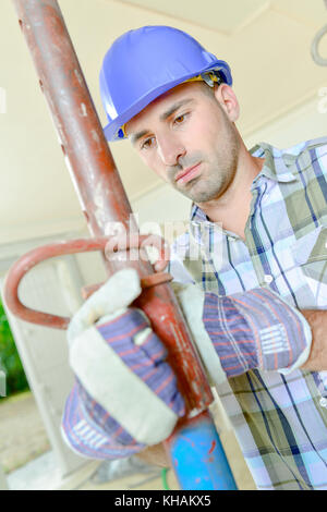 busy builder Stock Photo