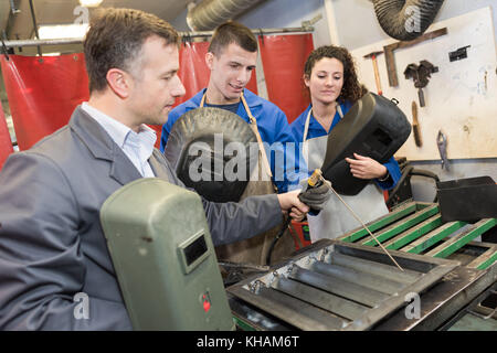 metalwork apprentice in metallurgy training class Stock Photo