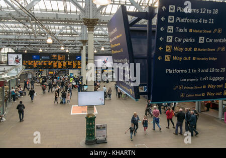 New station signage over the main concourse at Waverley Station, Edinburgh,Scotland,UK Stock Photo