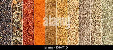 Collage of different herbs and spices background Stock Photo