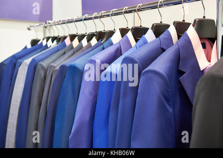 Shirts on hangers. men's suit Stock Photo by ©vtmila 125029620