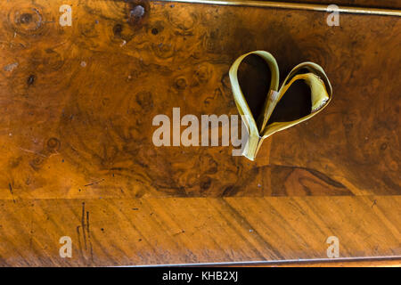 heart lies on the piano Stock Photo