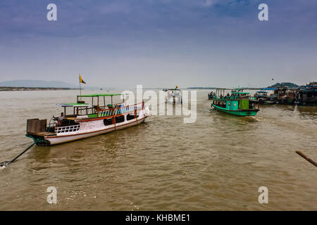 Tourist boats on the Irrawaddy River near Mandalay, Myanmar Stock Photo