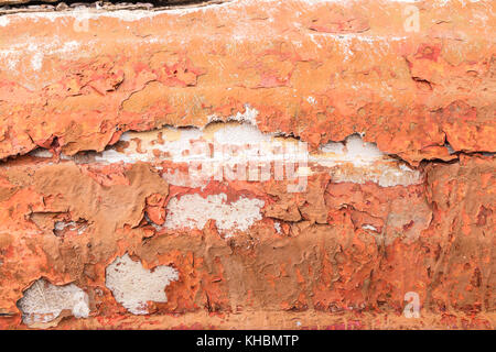 Old painted synthetic surface with scratches and cracks, background/texture. Stock Photo