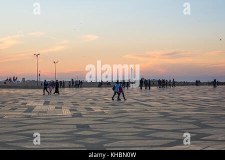 Casablanca, Morocco - November 7, 2017 : people walking in Hassan II mosque's square Stock Photo