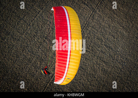 Paraglider over ploughed field, near Algodonales, Andalusia, Spain Stock Photo