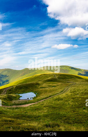 Footpath Through The Grassy Hills Of The Mountain. Beautiful Summer 