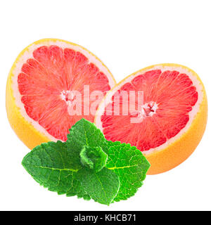 Isolated fruits. Two half grapefruit with mint leaf isolated on white background with clipping path as package design element. Stock Photo