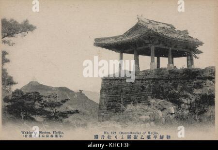 Postcard marked Wakizaka Shoten, Heijo, No 127 Otsumitsudai of Heijo, featuring an open structure atop a brick wall, overlooking hills, Pyongyang, North Korea, 1915. From the New York Public Library. Stock Photo