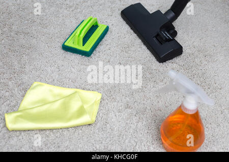 Cleaning Service man cleaning  floor with machine on Carpet to work Stock Photo