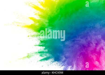 Multicolored powder explosion on white background. Stock Photo