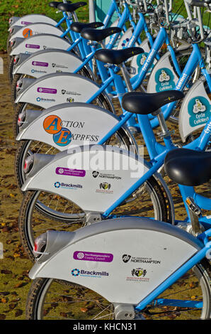 Row of cycles in Becket's Park, Northampton; part of Cycle Connect , a self-service bike hire scheme for getting about quickly and cheaply. Stock Photo
