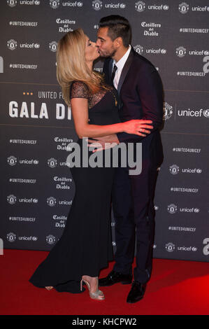 Sergio Romero his wife Eliana Guercio attend a gala dinner at Old Trafford in Manchester, held by Manchester United and Unicef to raise funds for the charity. Stock Photo