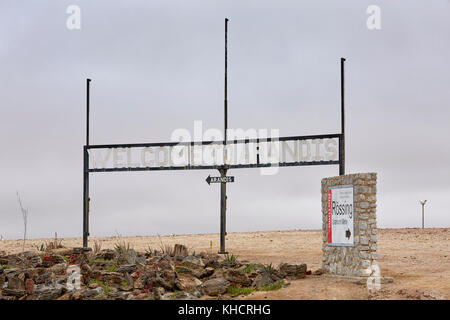 Welcome to Arandis and Rio Tinto Rossing Uranium Mine signs in Namib Desert near Arandis, Namibia, Africa