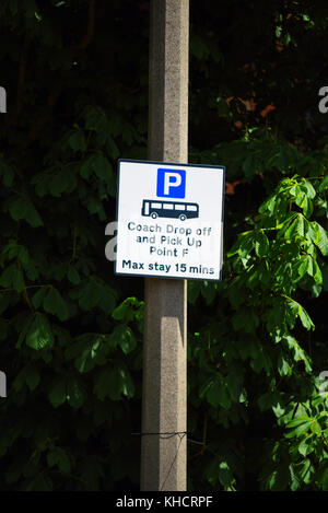 Coach drop off and pick up point F. Coach parking for visitors to Southend on Sea, Essex. Sign. Signpost. Sign post Stock Photo