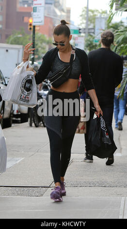 Model Bella Hadid, handbag detail, is seen on July 01, 2021 in