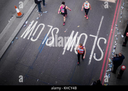 Late runner in a fancy dress at the London Marathon 2017. Landscape format. Stock Photo
