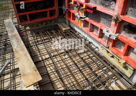 Reinforcement bars of an RC slab in a construction site. Stock Photo