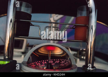 Compass rose of a yacht sailing west with a cruising chute at dawn in the Indian Ocean. Stock Photo
