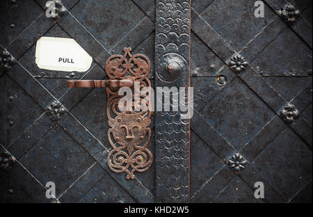 Details of old decorative doors, closeup view on door lock ornaments. Stock Photo